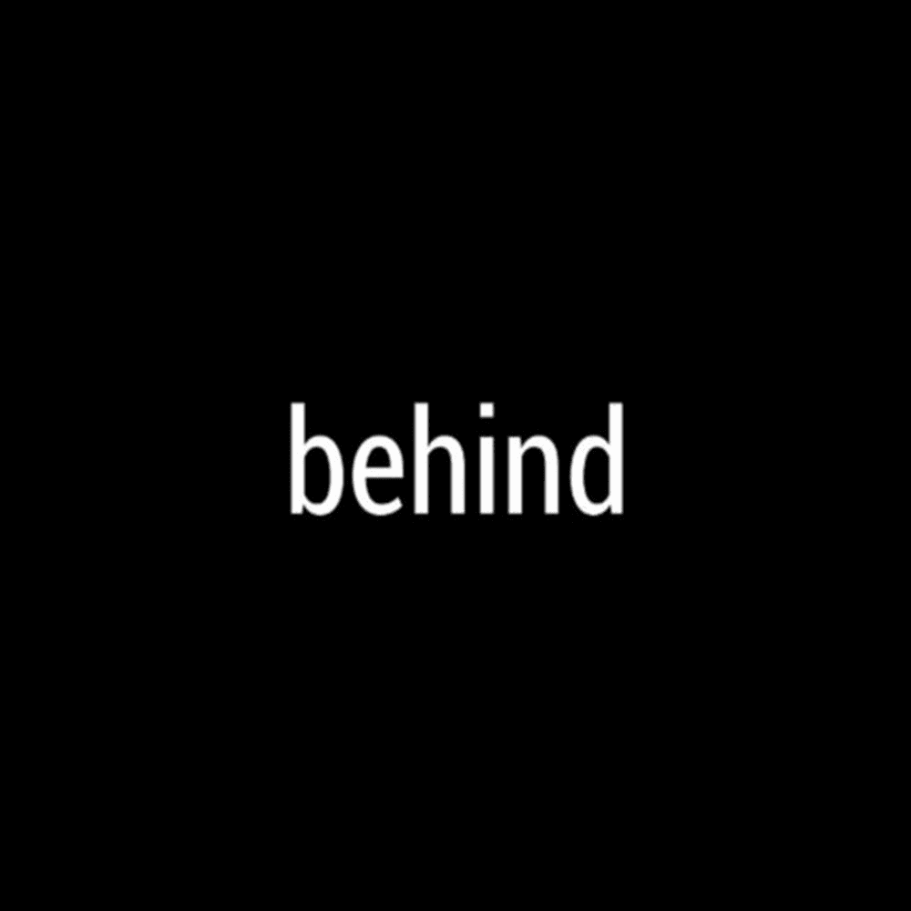 behind